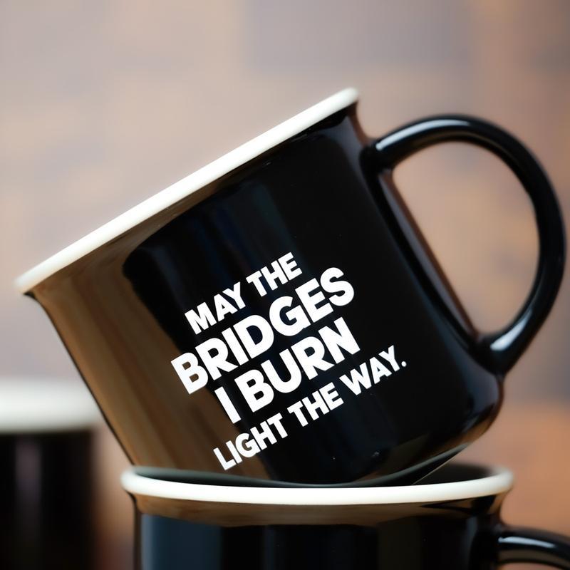 http://www.offthewagonshop.com/cdn/shop/products/meriwether-drinkware-mugs-may-the-bridges-i-burn-coffee-mug-funny-gag-gifts-29692264218785.jpg?v=1624623347